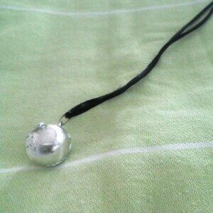 Silvertone Globe Necklace on Black Cord